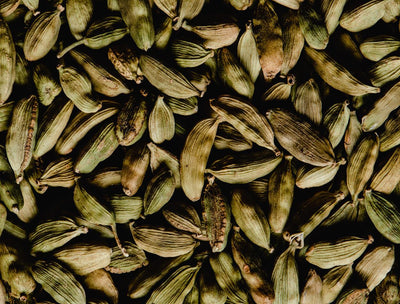 Ayurvedic Spice Cabinet: Cardamom for Digestion, Oral Health & More